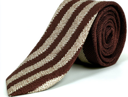 Brown and beige striped tie isolated on white backgroundの素材