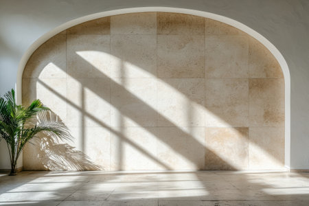 Sunlight streaming through an arched doorway onto a tiled wall and floor.の素材