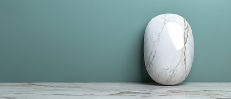 Marble oval against a teal wall, perfect for product display.の素材