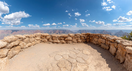 Scenic view of a canyon from a stone overlook on a sunny day.の素材
