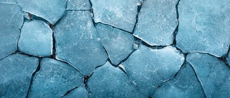 Fractured blue ice floes create a mesmerizing abstract pattern.の素材