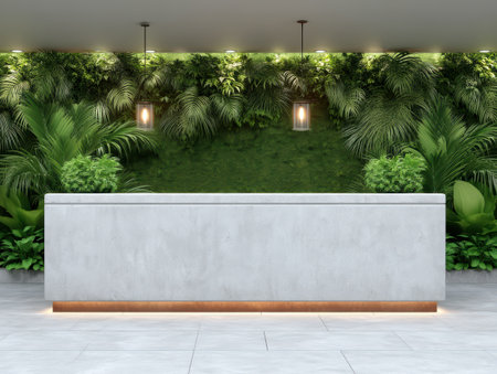 Lush green wall behind a modern reception desk.の素材