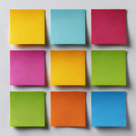 Colorful sticky notes arranged in a grid pattern.の素材