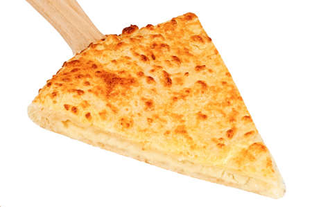 Freshly cooked slice of cheese-filled pie on wooden spatula isolated on white backgroundの写真素材