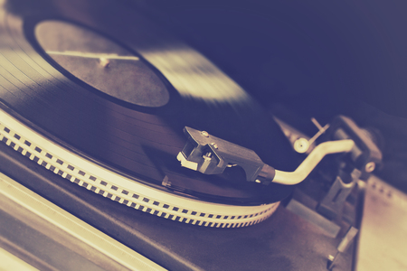 retro turntable, vinyl record, vintage toned effectの写真素材