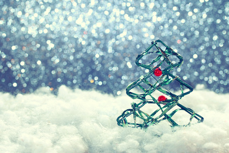 christmas, new year celebration background with decorative ornaments fir tree, toned image effectの写真素材