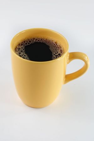 coffee in yellow mugの写真素材