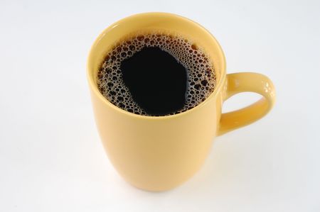 coffee in yellow mugの写真素材
