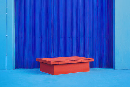 Empty podium for product display on blue wall background - Vintage Light Filterの素材