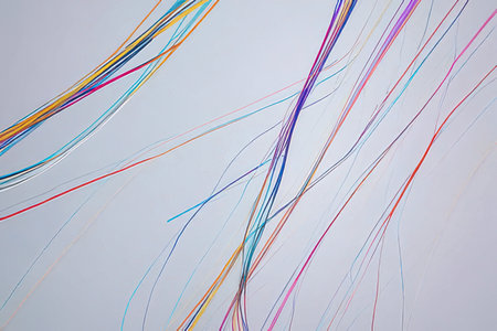 Colorful ribbons on white background, close-up of photoの素材