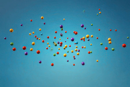 Colorful balloons flying in the blue sky. Space for text.の素材