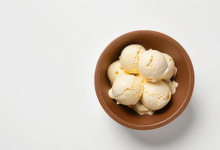 Scoops of ice cream in a bowl on white backgroundの素材