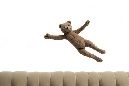 Brown teddy bear on sofaの素材