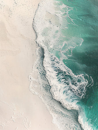 Aerial view of turquoise ocean waves breaking on sandy beachの素材