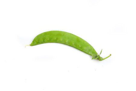 Green peas isolated on white background. Clipping Paths included.の素材