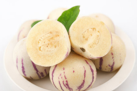 Melon in white bowl on white background, shallow dofの素材