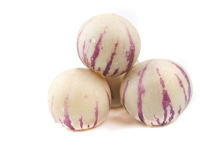 Melon isolated on white background. Clipping path included in file.の素材