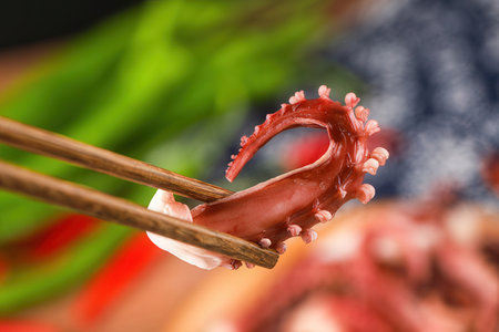 Close up of octopus on chopsticks. Shallow depth of fieldの素材
