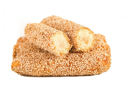 Crispy sesame cookies on a white background. Isolatedの素材