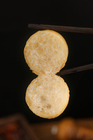Sesame glutinous rice cake on black backgroundの素材