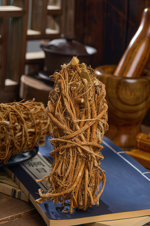 Ginger root in bamboo basket on white background, Isolated.の素材