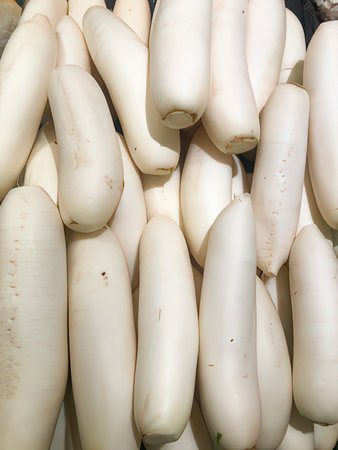 White radish for sale at a market in the city of Seoul in South Korea.の素材