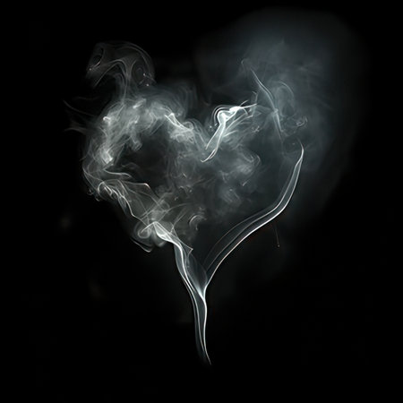 Smoke heart on black background. Abstract background. Design element.の素材
