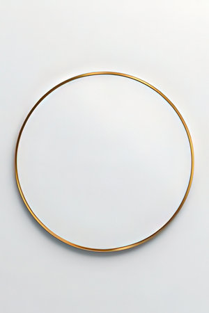 Round gold frame on a white background. 3d render. Top view.の素材
