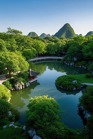 Beautiful view of korean garden with pond and mountains, South Koreaの素材