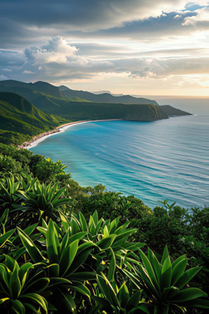 Beautiful seascape with green hills and blue sea at sunsetの素材
