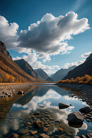 Mountain lake with reflection of clouds and blue sky in autumn.の素材