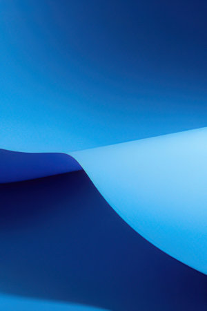 abstract blue background with some smooth lines in it and some curvesの素材