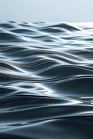 blue water surface with some smooth lines in it - abstract photo backgroundの素材