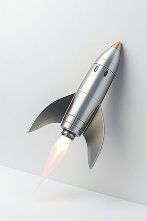 3d rendering of a silver rocket on a white wall background.の素材