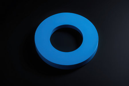 3d rendering of a blue letter O on a black background.の素材