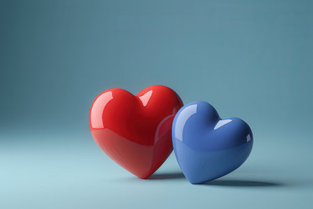 Two hearts in blue and red on a blue background. 3d renderingの素材