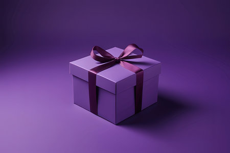 Gift box with bow on purple background. 3D rendering.の素材