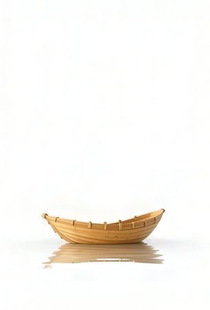 Bamboo boat isolated on white background, clipping path included in file.の素材