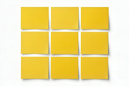 Yellow sticky notes on a white background. 3d rendering. Square.の素材