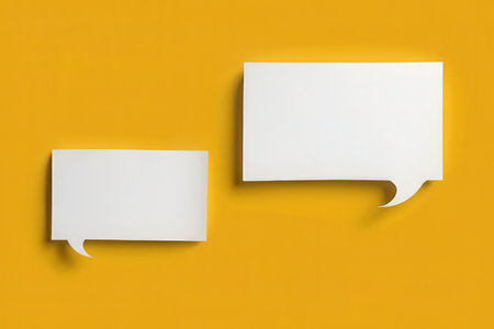Blank paper speech bubbles isolated on yellow background. 3d renderingの素材