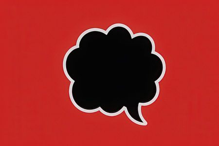 Speech bubble on a red background. Copy space for text.の素材