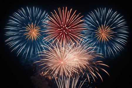 Colorful fireworks of various colors over night sky background, celebration conceptの素材