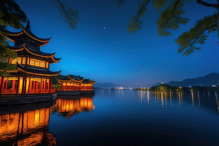 Night view of Hangzhou West Lake, China. Hangzhou West Lake is a famous tourist destination in China.の素材