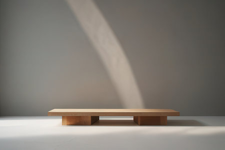 Wooden shelf on the floor with shadow on the wall. 3d renderingの写真素材