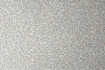 Decorative floral pattern on the wall of the house. Background.