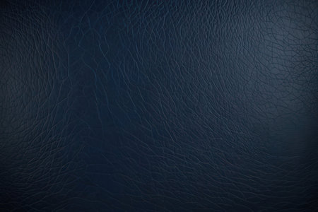 Dark blue leather texture background for design with copy space for text or image.の写真素材