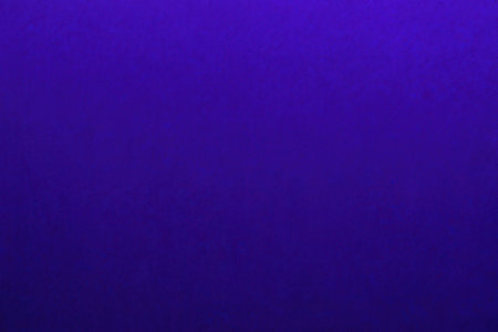 violet background with some shades on it and grunge paper texture