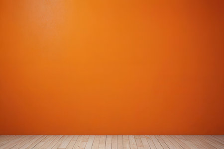 Orange wall and wooden floor with copy space for your text or imageの写真素材
