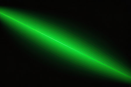 green laser beam on a black background, close-up of photoの写真素材