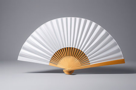 Folding fan isolated on a gray background. 3d rendering.の素材